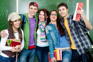 group of happy high school students